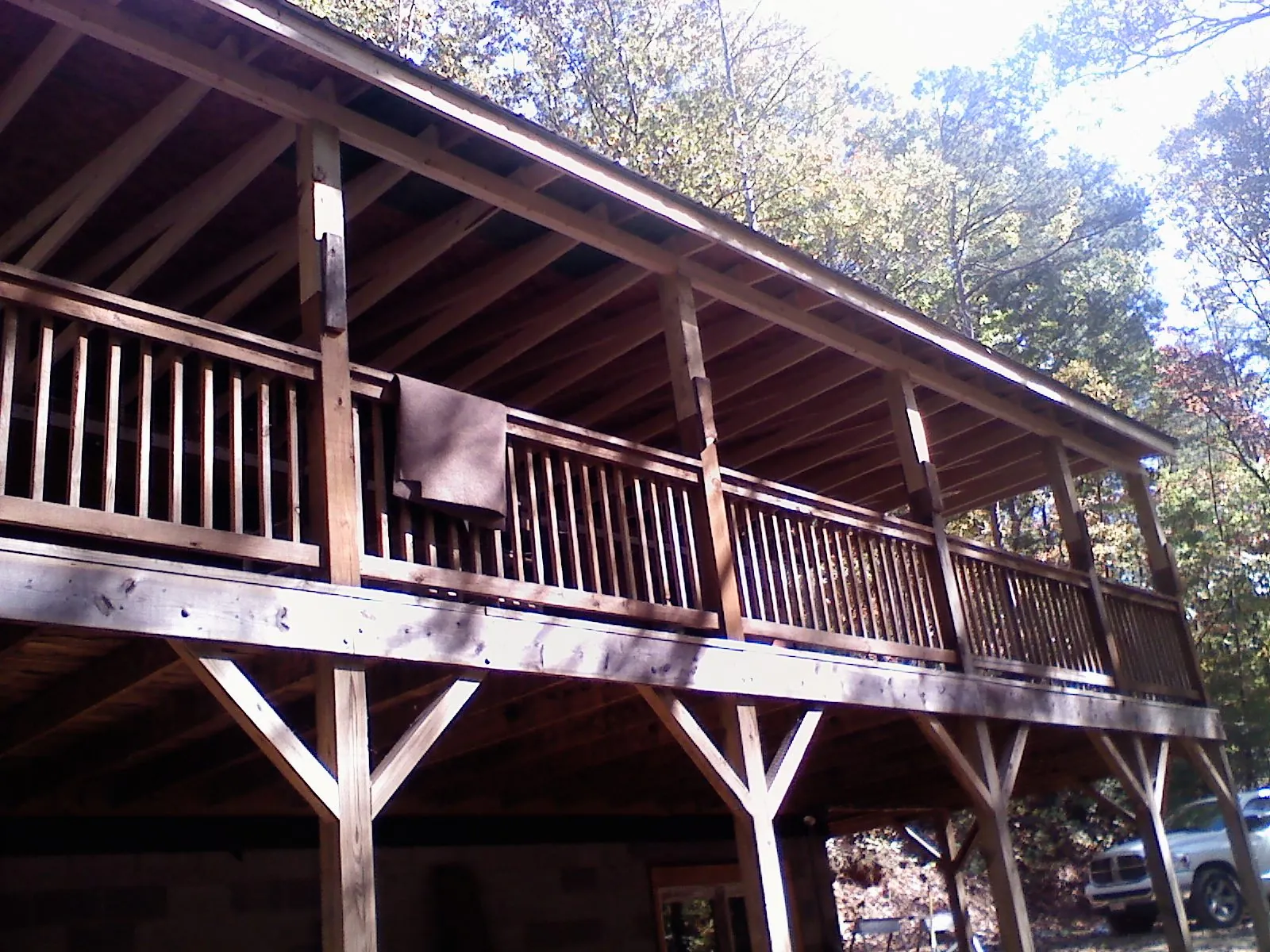 Timber framing under a new elevated porch and deck — Roof Leak Repair in Upper Falls by Roofing Brothers